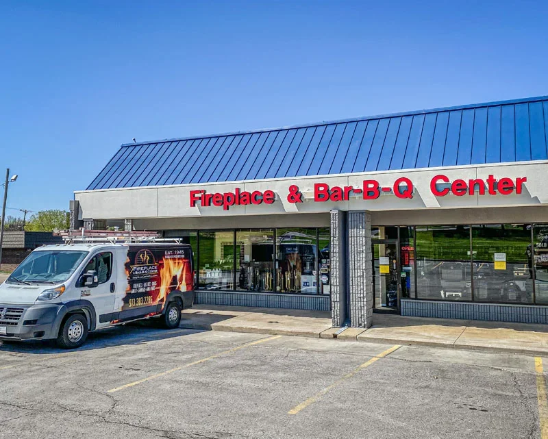 The Fireplace and Bar-B-Q Center storefront at 10470 Metcalf Ave in Overland Park, with the service van parked out front